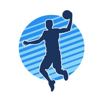 Hareketli bir erkek basketbolcunun silueti. Basketbol oynayan bir adamın silüeti..