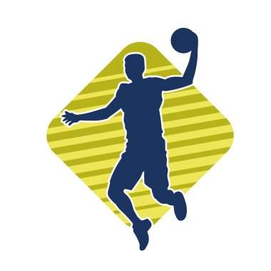 Hareketli bir erkek basketbolcunun silueti. Basketbol oynayan bir adamın silüeti..