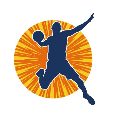 Hareketli bir erkek basketbolcunun silueti. Basketbol oynayan bir adamın silüeti..