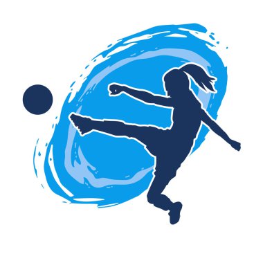 Topa vuran bayan futbolcunun silueti. Hareketli bir futbolcu kadının silueti..