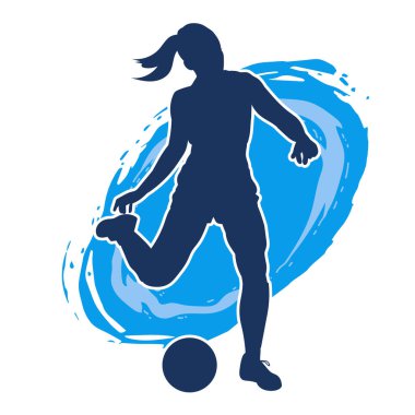 Topa vuran bayan futbolcunun silueti. Hareketli bir futbolcu kadının silueti..