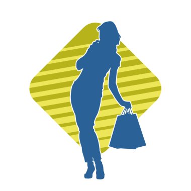 Sıska, alışveriş torbaları taşıyan genç bir kadının silueti. Alışveriş torbaları taşıyan şık bir kadının silueti.