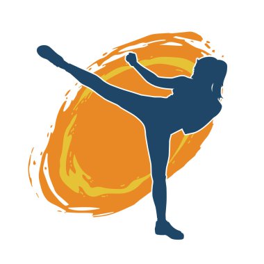 Dövüş sanatları tekmesi atan bir kadının silueti. Sportif bir kadının silueti tekme hareketi yapıyor..