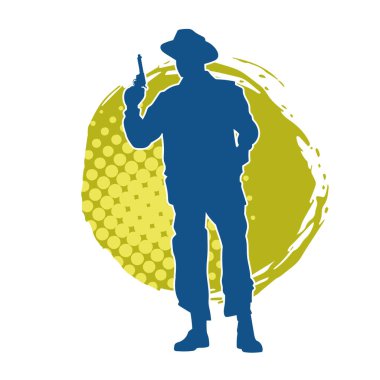 Kovboy kostümü giymiş bir adamın silüeti. Tabanca tabancası taşıyormuş gibi poz veriyor.