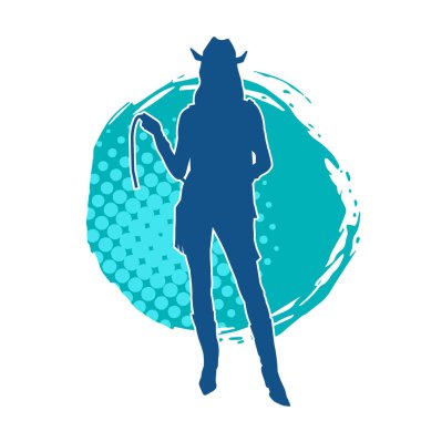 İnce bir kadın modelin silueti kovboy kostümü giymiş ve kementle ip taşıyor. Bir kovboy kız silueti kement ipiyle poz veriyor..