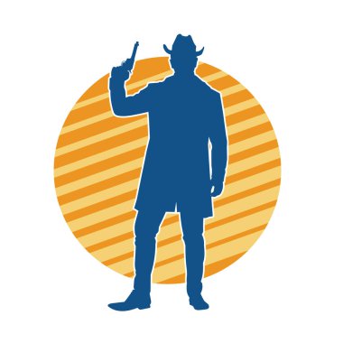 Kovboy kostümü giymiş bir adamın silüeti. Tabanca tabancası taşıyormuş gibi poz veriyor.