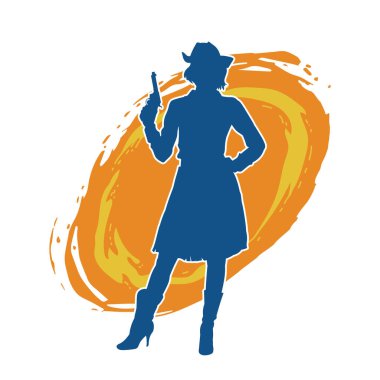 Kovboy kostümü giymiş zayıf bir kadının silueti. Tabanca tabancası taşıyan pozu. Kovboy kız kostümlü bir kadın modelin silueti..