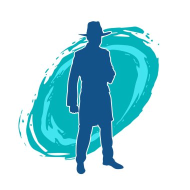 Uzun paltolu ve kovboy şapkalı bir adamın silueti.