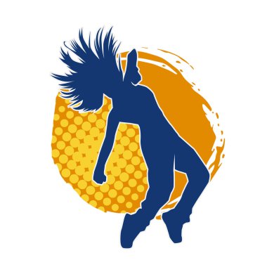 Modern dansçı pozunun silueti. Hip hop dansı yapan genç bir kızın silueti.