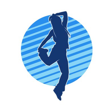 Modern dansçı pozunun silueti. Hip hop dansı yapan genç bir kızın silueti.