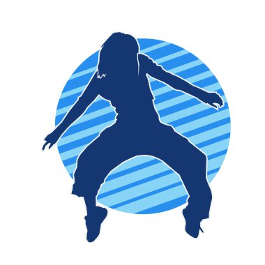 Modern dansçı pozunun silueti. Hip hop dansı yapan genç bir kızın silueti.