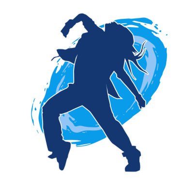 Modern dansçı pozunun silueti. Hip hop dansı yapan genç bir kızın silueti.