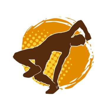 Poz veren bir erkek dansçının silueti. Dans eden bir adamın silueti.