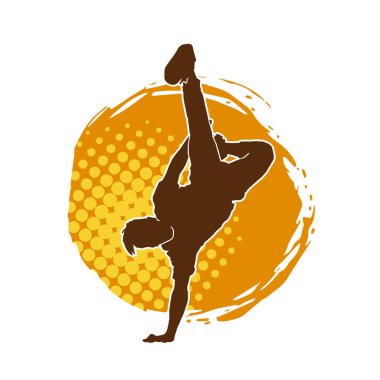 Poz veren bir erkek dansçının silueti. Dans eden bir adamın silueti.