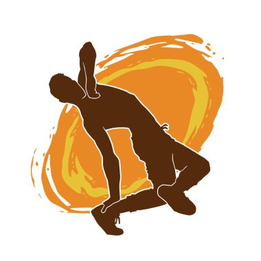 Poz veren bir erkek dansçının silueti. Dans eden bir adamın silueti.