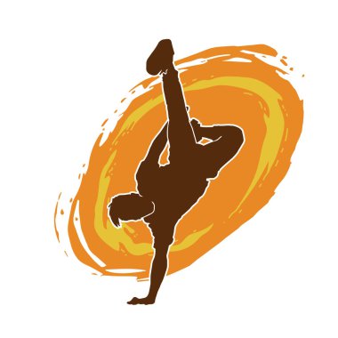 Poz veren bir erkek dansçının silueti. Dans eden bir adamın silueti.