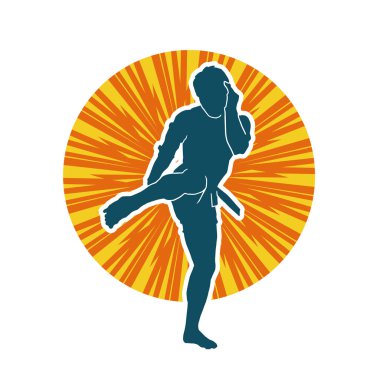 Hareketli erkek kickboksör atletinin silueti. Kickboks yapan bir adamın silueti..