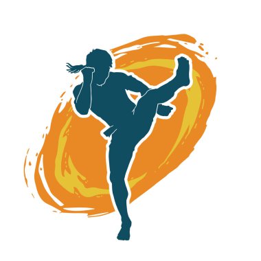 Hareketli erkek kickboksör atletinin silueti. Kickboks yapan bir adamın silueti..