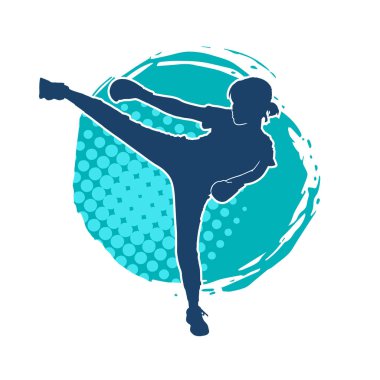 Dövüş sanatları tekmesi atan bir kadının silueti. Sportif bir kadının silueti tekme hareketi yapıyor..