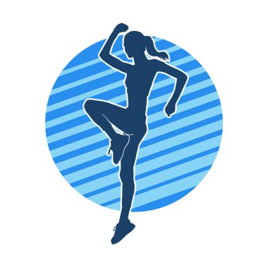 İnce bir kadın dans pozu silueti. Aerobik hareket eden bir kadının silueti..