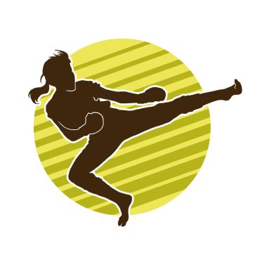 Dövüş sanatları tekmesi pozu veren bir kadının silueti. Dövüş sanatlarındaki bir kadının silueti tekme atma pozu veriyor..