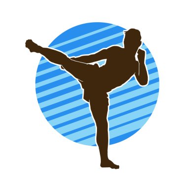 Hareketli erkek kickboksör atletinin silueti. Kickboks yapan bir adamın silueti..