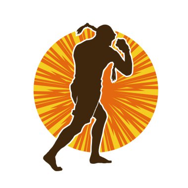 Hareketli erkek kickboksör atletinin silueti. Kickboks yapan bir adamın silueti..