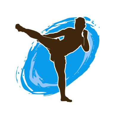 Hareketli erkek kickboksör atletinin silueti. Kickboks yapan bir adamın silueti..