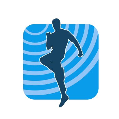 Hareket halindeki bir erkek dansçının silueti. Dans eden zayıf bir adamın silueti..