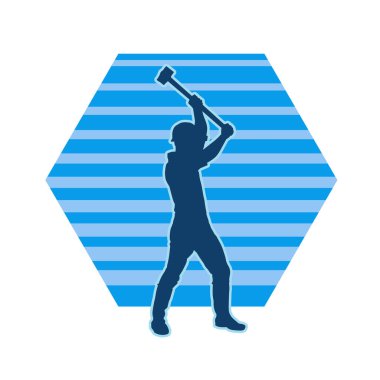 Silhouette of a worker in action pose using his sledge hammer tool. clipart