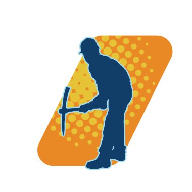 Görev sırasında baltayla dolaşan işçi kostümlü bir adamın silüeti. Bir madencinin hareket halindeki silueti balta aracı ile poz verir.