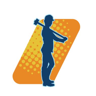 Çalışan bir işçinin silueti balyoz aletini kullanarak hareket halinde poz verir.