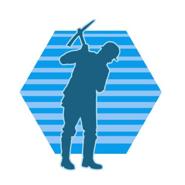 Görev sırasında baltayla dolaşan işçi kostümlü bir adamın silüeti. Bir madencinin hareket halindeki silueti balta aracı ile poz verir.