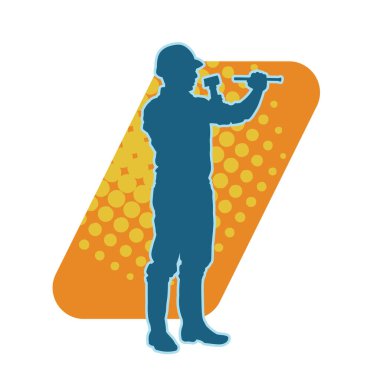 Çekiç aleti taşıyan bir işçinin silüeti. Hareket halindeki bir işçinin silueti çekiç aleti ile poz verir.