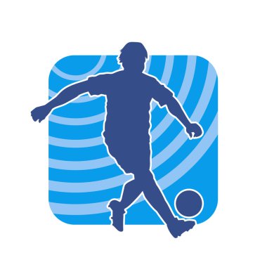 Top tekmeleyen bir erkek futbolcunun silueti. Hareket halindeki bir futbolcunun silueti.