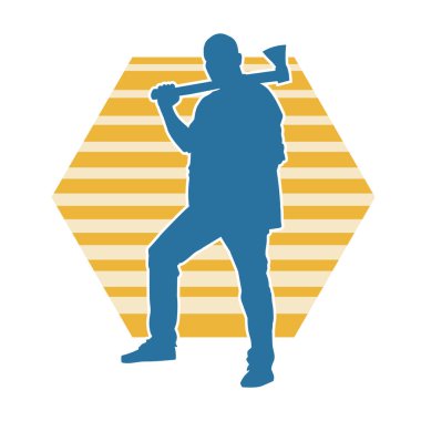 Balta sallayan bir erkek işçinin silueti. Balta sallayan bir orman oduncusunun silueti..