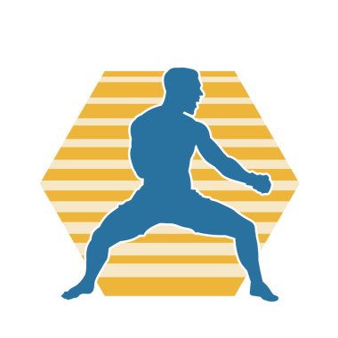 Tekme atan kickboksör bir atletin silüeti. Erkek Muay Thai dövüş sanatları dövüşçüsü silueti..