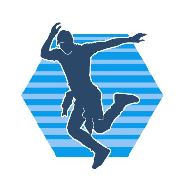 Dans eden bir adamın silueti. Erkek dansçının silueti poz veriyor..