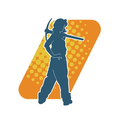 Kazma aletleri taşıyan işçi kostümlü bir kadının silüeti. Toplama aleti ile poz veren kadın silueti..