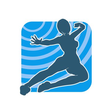 Sıska bir kadın dövüşçünün silueti tekme hareketi yapıyor. Bir kadın savaşçının silueti tekme pozu..