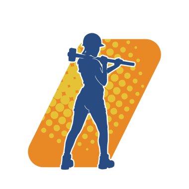 Açık havada çalışan bir modelin silueti balyoz teçhizatıyla poz veriyor.