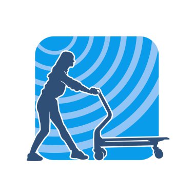 Tramvay tekerleği ya da el arabası kullanan bir kadın silueti. Bir kadının silueti. İten bir lori çarkının..