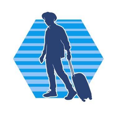 Seyahat valizi taşıyan bir erkek yolcunun silueti.