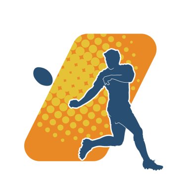Rugby sporcusunun silueti iş başında. Rugby oynayan sporcu bir adamın silueti..