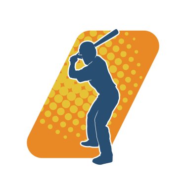 Hareketli bir erkek beyzbol oyuncusunun silueti. Vurucu olarak beyzbol oynayan bir adamın silueti..