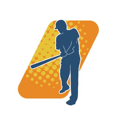 Hareketli bir erkek beyzbol oyuncusunun silueti. Vurucu olarak beyzbol oynayan bir adamın silueti..