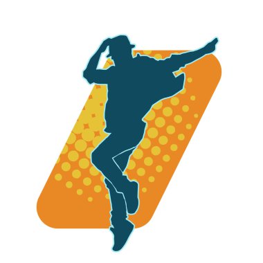 Hareket halindeki bir erkek dansçının silueti. Dans eden zayıf bir adamın silueti..