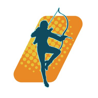 Dişi okçu bir dövüşçünün silueti ok ve yayla pozisyonunu alıyor..