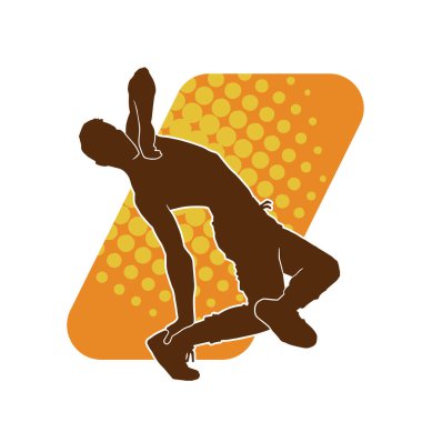 Poz veren bir erkek dansçının silueti. Dans eden bir adamın silueti.