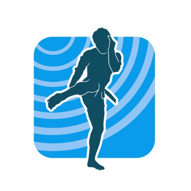 Hareketli erkek kickboksör atletinin silueti. Kickboks yapan bir adamın silueti..